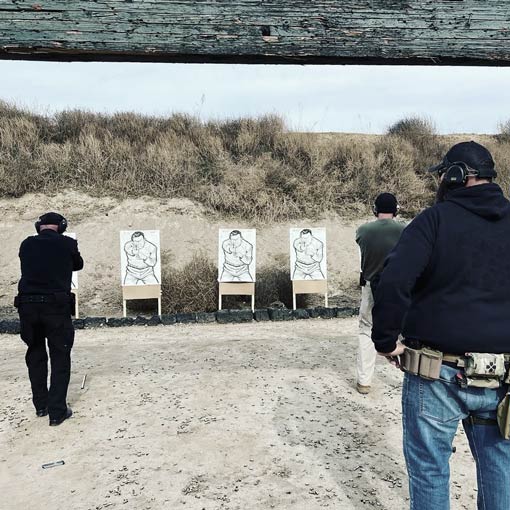 men at a firearms course